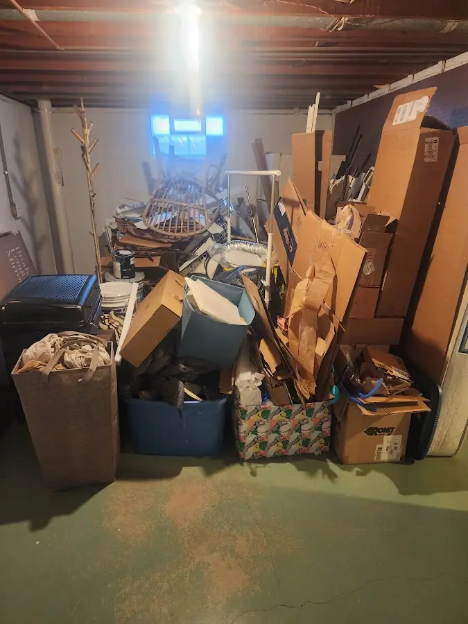 Roll-off dumpster container at job site for 6 Yard Dumpster Rental in Wilton